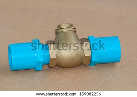 Bronze swing check valve and pvc pipe connection.