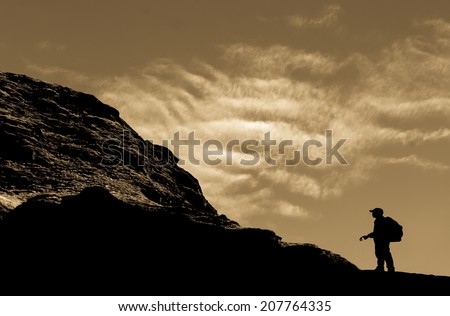 backpacker walking on the mountain