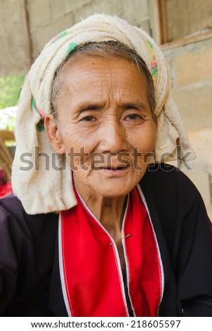 CHIANGMAI,THAILAND - SEP 16, 2014: Unidentified Palaung old woman in the Palaung traditional costume poses for the camera. Palaung people is a minority ethnic group living in northern Thailand