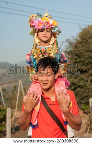 CHIANGMAI,THAILAND-MARCH 4 :Poi Sang Long festival, a ceremony where boys become novice monk, during in parade around Huay Mak Leim village on March 4,2015 in Fang district,Chiangmai,Thailand