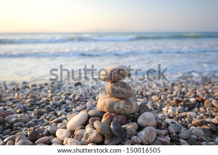 pyramid of stones, on the coast of the sea - Aegean sea - Rhodes