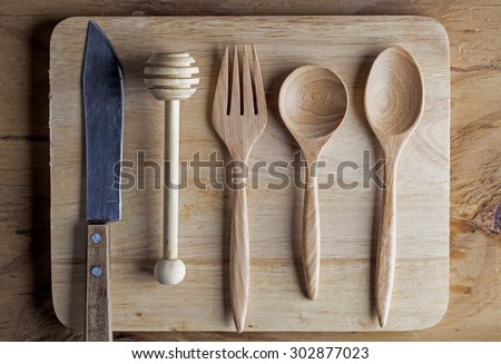 kitchen food styling ,utensils lying object on old wood plate