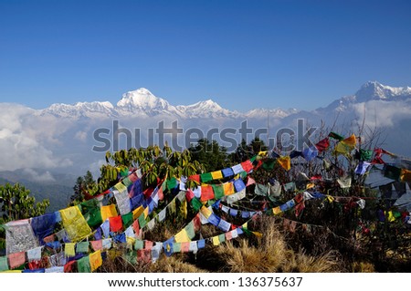 Annapurna mountain view from Poon Hill Peak with praying flags.