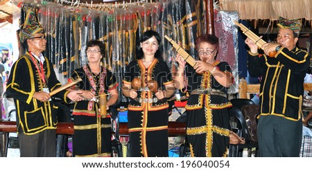 KOTA KINABALU, MALAYSIA - MAY 30: The Kadazan Dusun performs traditional music during Harvest Festival celebration May 30, 2014 in Kota Kinabalu, Sabah Borneo, Malaysia.