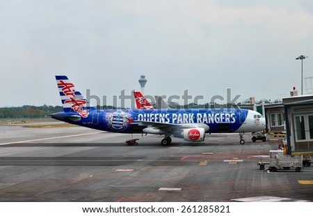 KUALA LUMPUR, MALAYSIA - JAN 24: AirAsia QPR Queens Park Rangers   Plane Livery landed in KLIA, Kuala Lumpur on January 24, 2015. AirAsia is an official partner of Queens Park Rangers Football Club.