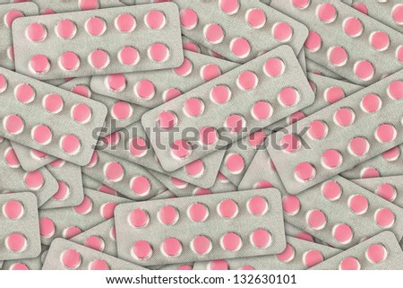 Pink pills packed in blister