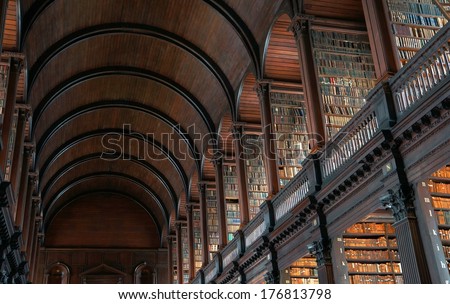 Dublin, Ireland - July 27: The Long Room In The Trinity College Library On July 27, 2013 In Dublin, Ireland. Trinity College Library Is The Largest Library In Ireland And Home To The Book Of Kells.
