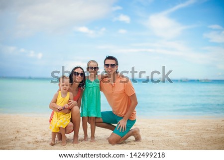 Portrait of a beautiful Caucasian family on tropical vacation