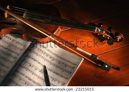 Vintage violin with the notes