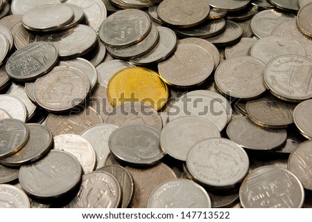Gold coin around silver coin