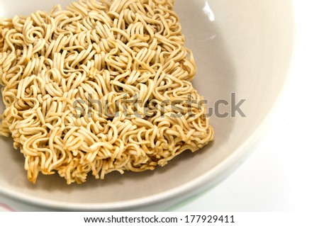 Dry instant noodle in a bowl
