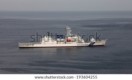ATAMI, JAPAN - MAY 19, 2014: A Japan Coast Guard ship anchored in Atami Bay, Shizouka Prefecture, Japan. The Japan Coast Guard is responsible for the protection of the coast-lines of Japan.
