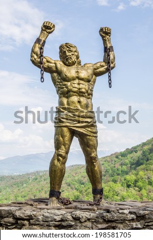 SOCHI, RUSSIA -Â?Â? APRIL 19, 2014: Statue of Unbound Prometheus with Broken Chain on the Eagle Rocks in the Caucasus