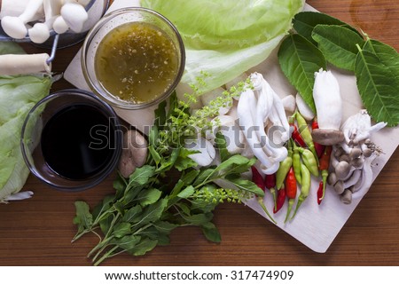 Ingredients for Thai food. chili, mushroom, sauce hairy basil, lemon leaf, soy sauce