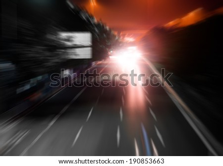 speed motion on road at night
