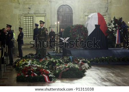 PRAGUE, CZECH REPUBLIC, DECEMBER 21:Hundreds people came to light a candle and pay tribute to coffin with body of Vaclav Havel displayed in Vladislav´s Hall in Prague, on 21st December, 2011.