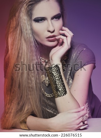 Fashion Rocker Style Model Girl Portrait. Hairstyle. Rocker or Punk Woman Makeup