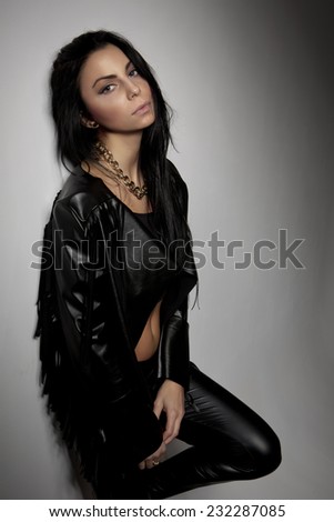 Fashion Rocker Style Model Girl Portrait. Rocker or Punk Woman Makeup
