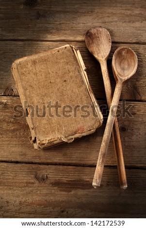 cooking book and spoons