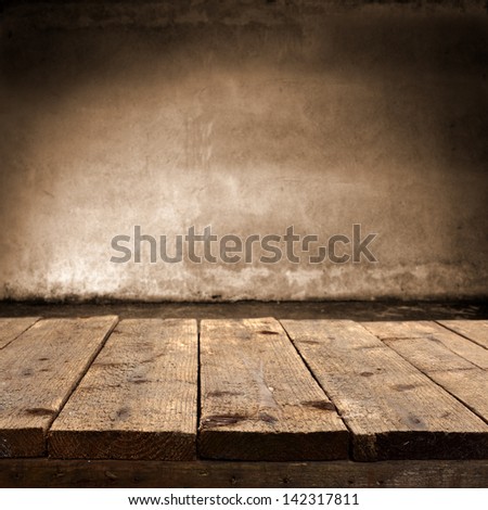 Dirty Table Of Wood And Dark Wall