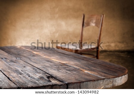 empty dark table and chair in interior