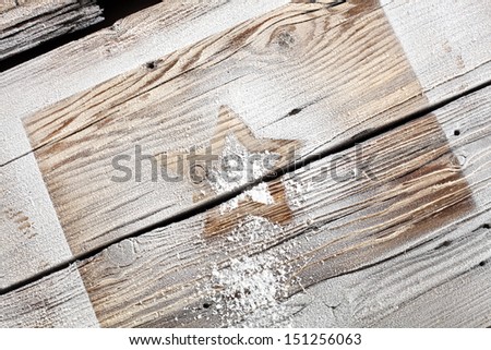 star of snow and wooden desk of dirty color