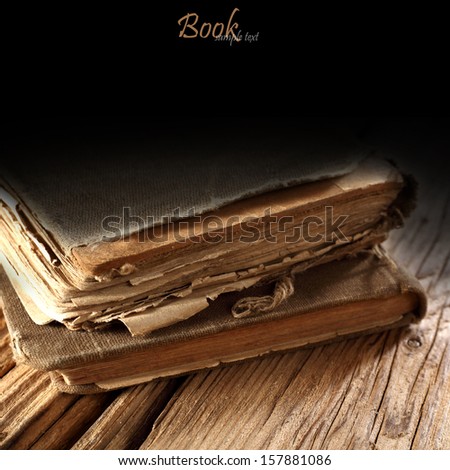 two books and wooden desk