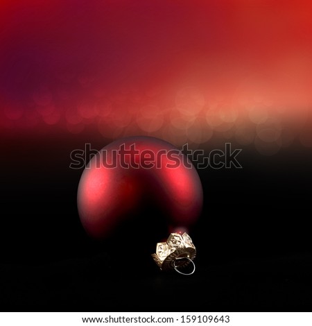 dark red ball on black and red background space