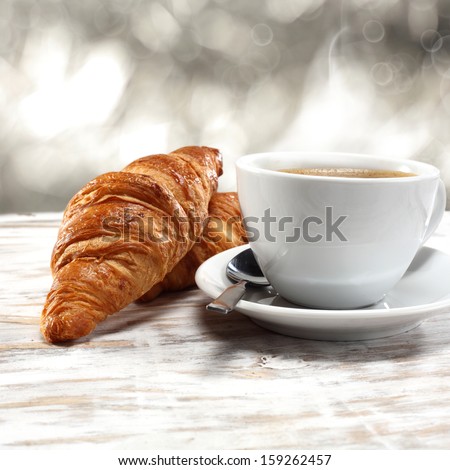 Fresh Croissant And Coffee