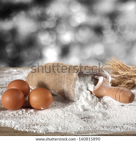 sack of flour and eggs