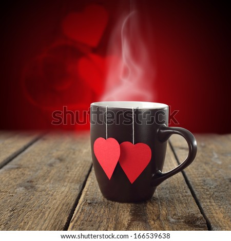 single cup of love on dark table