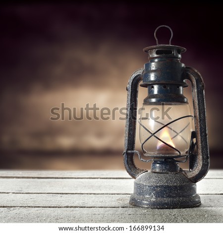 desk of snow and oil lamp