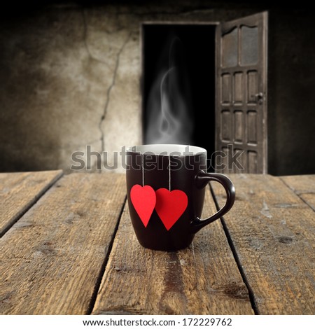 single mug and love heart on desk