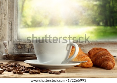 smell of coffee with croissant and garden