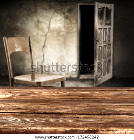 dark brown desk and open door