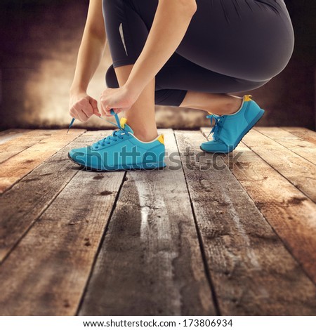 shoes of blue color and retro brown floor of wood