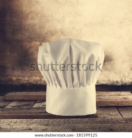 single white cook in kitchen and vintage photo