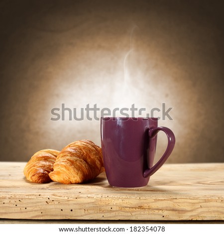 croissant hot coffee and red mug