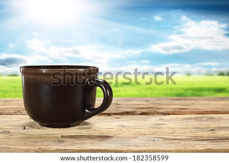 rural mug sill of wood and sky