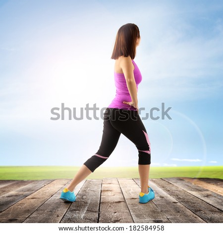 wooden desk and woman in sport