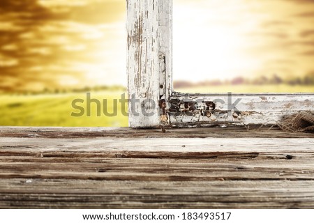 sill of wood and sunset