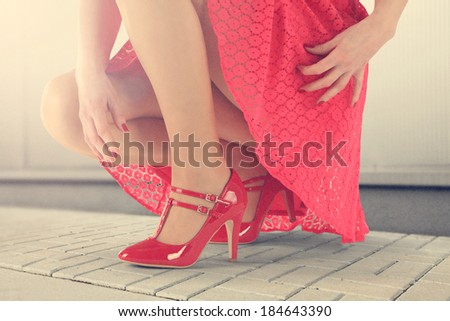 woman and red skirt