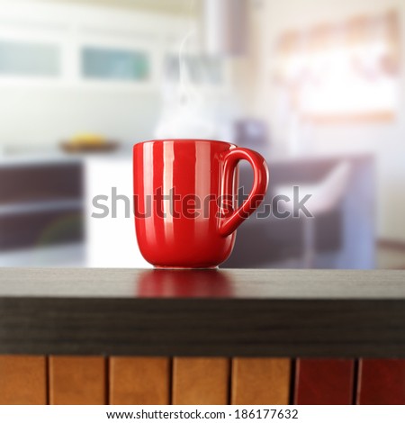 red mug books and modern kitchen