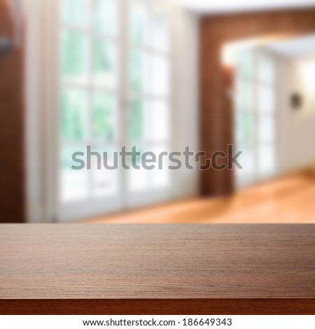 dark brown desk and window in home