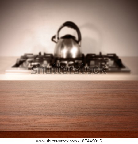 photo in kitchen and desk of brown