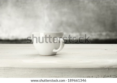 white mug and white sill with white wall