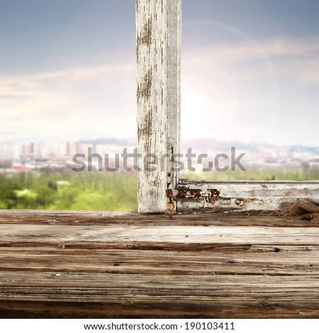 retro sill of wood and wooden frame with landscape