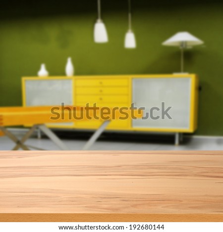 yellow desk and green wall