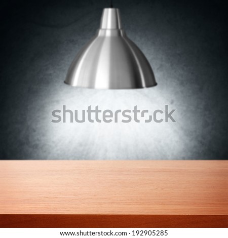 red desk lamp and wall of light