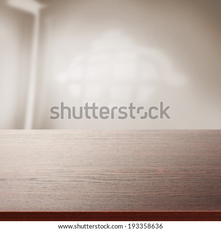 dark brown desk and window shadow